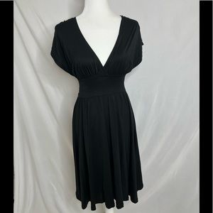 Ted Baker Black dress size 1 equal to a 4 in US.